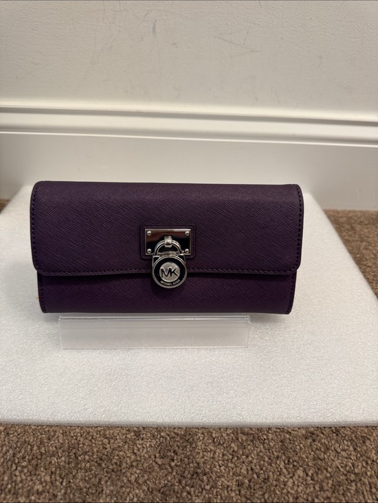 Michael Kors Handbags - Michael Kors Plum Saffiano Leather Wallet Clutch with Silver MK Lock